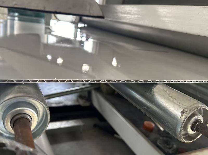 Aluminum corrugated panel composite line